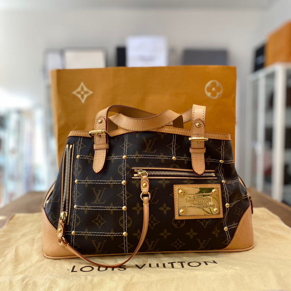 Louis Vuitton Surene Handbag Monogram Empreinte Leather BB Neutral