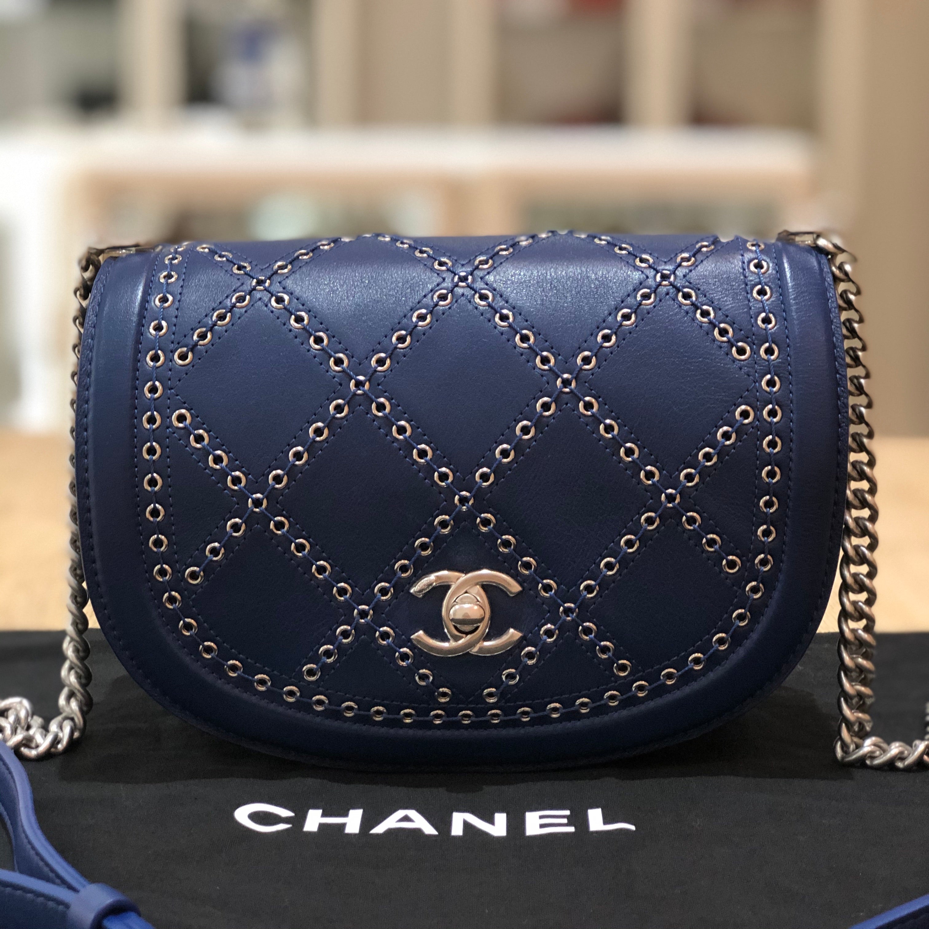 Chanel Coco eyelet flap bag